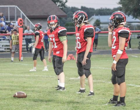 Beaverton’s (left to right) Sawyer Gordert, Angel Cerda and Logan Klimkiewicz prepare for the snap during a recent junior varsity game.