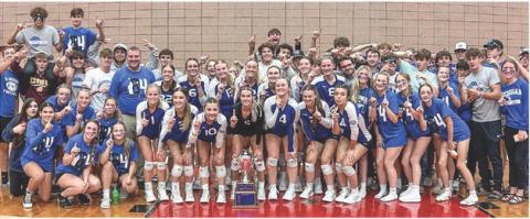 The student section is pictured with the team after the win bringing the Cedar Cup back to Gladwin.
