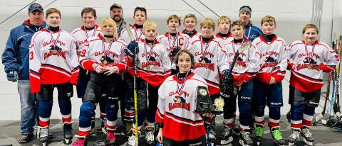 Pictured in back row: assistant coach, Jim Oard; Landon Jenkins, Cameron Oard, assistant coach, Ryan Harris; Trinity Hair, Parker Woods, Korbin Harris, Caden McKeever, head coach, Devin Woods; middle row: Addison Anderson, Noah Bruursema, Hunter Eagan, Noah Scott, Preston Newman, Adalynn Lechner; front row: Calvin Knoerr (Goalie).