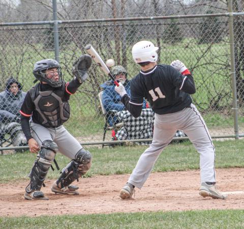 Beaverton’s Landon Love avoids a little chin music during Saturday’s Dar Grove Baseball Tournament.