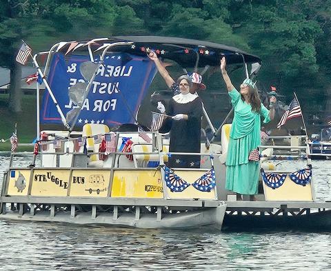 Costumes and decorations livened up the Pratt Lake Association Boat Parade Saturday. The event had been discontinued the past few years, but this year’s elevated lake level and the holiday spirit brought it back with hopes that it will continue annually in the future. SAGE TOWNSHIP