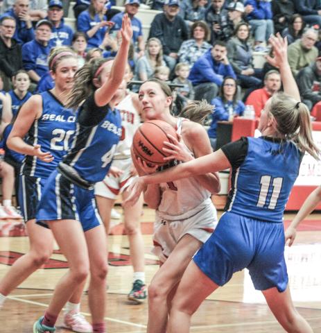 Beaverton’s Trinity Danielak fights her way through the Beal City defense during last Wednesday night’s overtime loss to the Aggies in the Division 3 district semifinals.