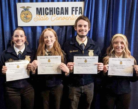 Pictured left to right: Megan Veitengruber (Clare High School), Madison Forfinski, and Tyler Wardwell (Farwell High School), alongside Grace Taylor (Harrison High School), proud recipients of the State FFA Degree Certificate. Veitengruber and Forfinski were also presented with Gold Awards for Academic Excellence.
