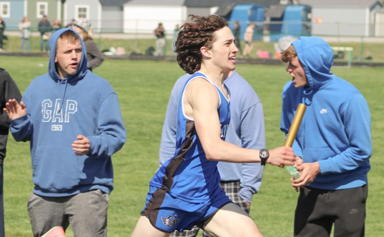 Gladwin’s Myles Robinson opens up a lead running the second heat of the 1600 relay Saturday at the Jack Pine Conference Meet at Pinconning.