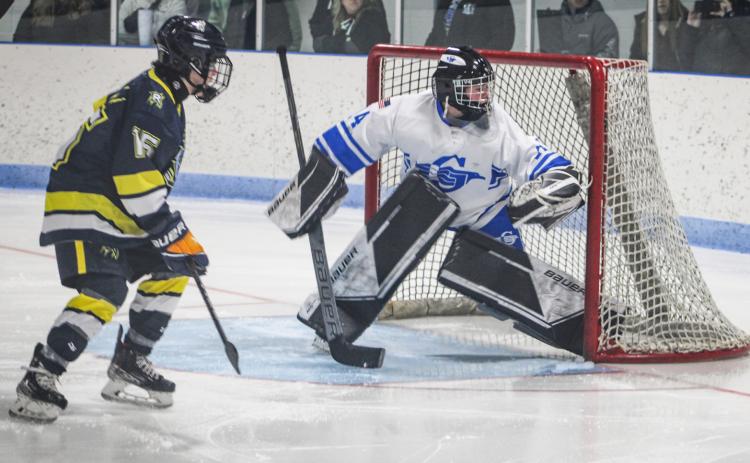 Gladwin goalie Preston Willert guards his cage during Saturday’s mercy ruleshortened 9-1 victory over the MId-Michigan Raptors.