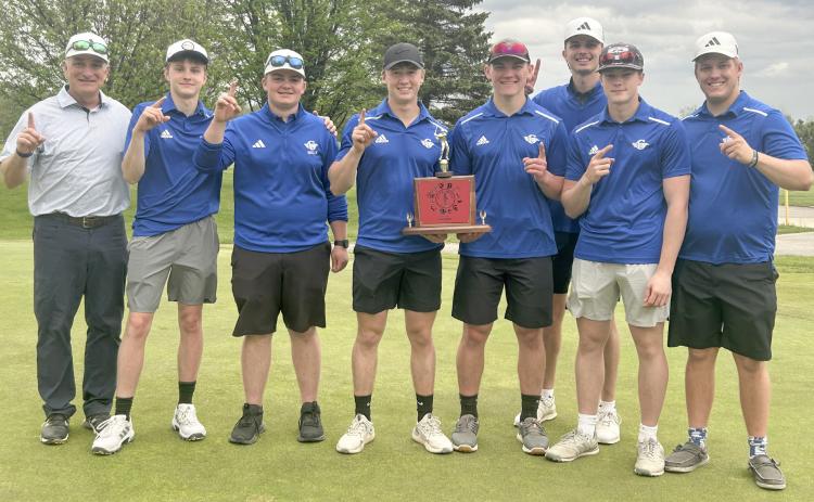 The Gladwin golf team and coaches let the world know who is No. 1 in the Jack Pine conference after clinching the championship last week at Sugar Springs.