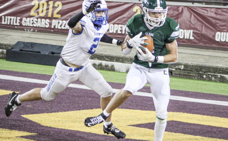 lare’s Jacob Halicek catches a touchdown pass during Friday night’s victory over Ortonville Brandon at Central Michigan University’s Kelly/Shorts Stadium.