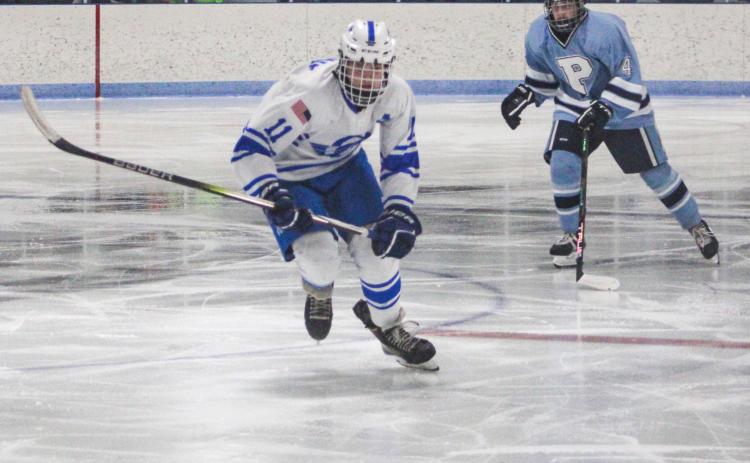 Clay Newman scored the inner in overtime Friday night when the Gladwin hockey team topped the visiting Lakeshore Badgers 6-5.