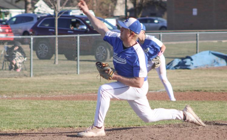 Gladwin’s Scott Inscho delivers a pitch during a recent game. The Flying G’s won four out of six games last week.