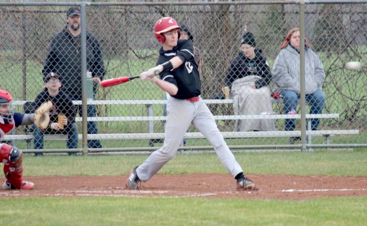 Reese Longstreth swings, looking to knock the ball for a base hit.