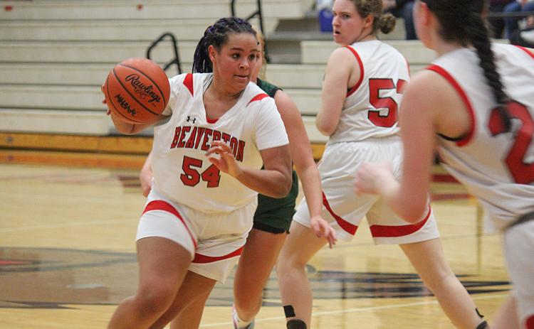 Leiyah Mungin drives towards the net against Clare.