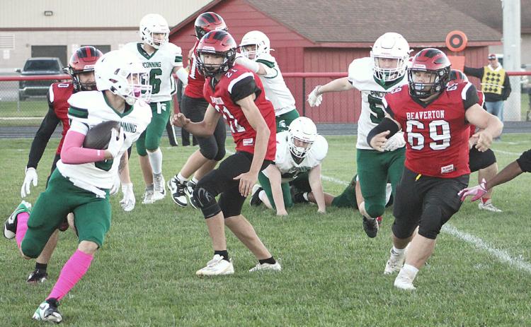 Beaverton’s Sean Doyle chases down a Pinconning running back during Friday night’s Homecoming victory over the Spartans.