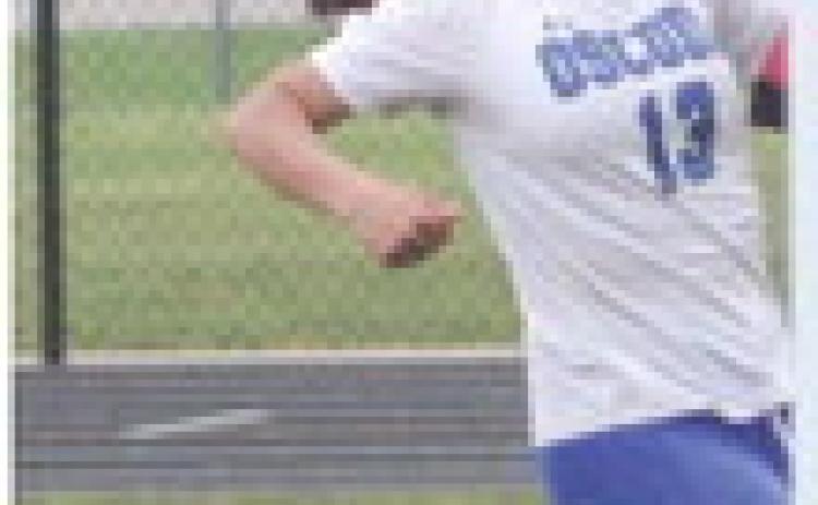 Beavers roll to first district soccer victory