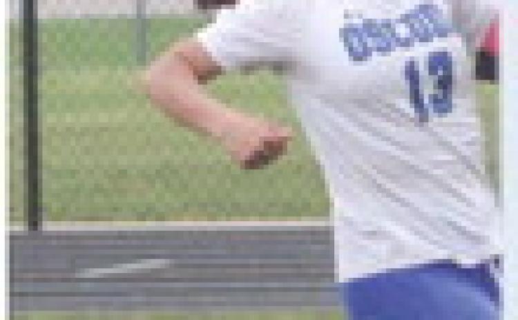 Beavers roll to first district soccer victory