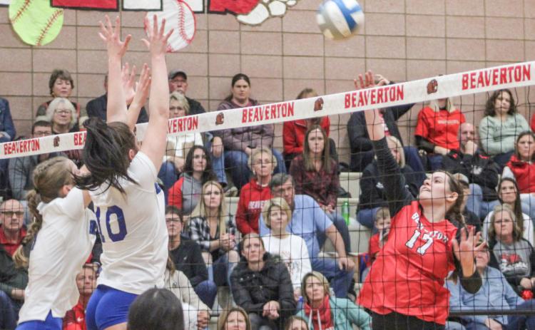 Beaverton’s Kaelyn Fischer goes for the kill during the Beavers five-set loss to Beal City in the Division 3 district finals Thursday.