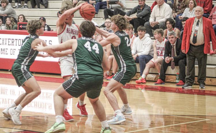 Beaverton’s Caiden Loar runs into a brick wall of Pinconning defenders during Thursday night’s game.