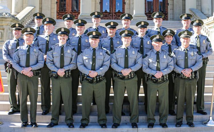 Pictured with command staff from the Michigan DNR Law Enforcement Division, 12 new conservation officers graduated from the 12th Conservation Officer Training Academy, Thursday, Nov. 9, in Lansing. The officers were hired as probationary COs who were already licensed law enforcement officers in Michigan and previously served different communities. The 10-week academy focused on fish, game and recreational laws, rules and regulations specific to natural resources.