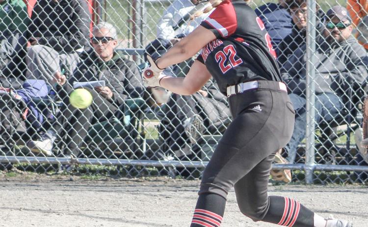 Beaverton’s Brooke Remer puts the bat on the ball during Thursday’s doubleheader against visiting Pinconning.