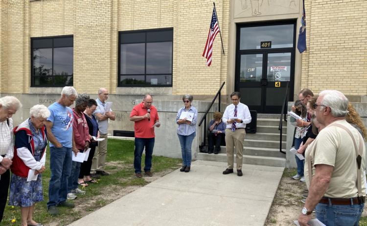Pastor Joe Dorais officiates at a prayer gathering honoring America’s 250th birthday Sunday at the Gladwin County Courthouse.