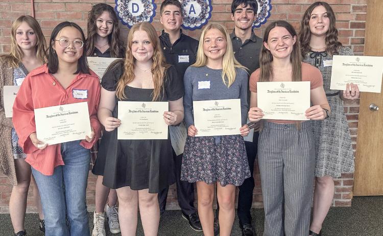 DAR Good Citizens pictured in front, left to right: Jessica Chai, Lily Winslow, Autumn Fransen, Kapre Lynch. In back left to right: Julia Lovett, Abigail Chapman, Brayden Dee, David Abreu, Ella Karbowski. Absent is Tyler Heal.