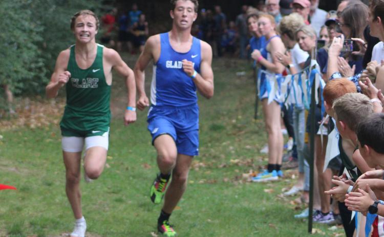Clare’s Brad White edges Gladwin’s Caleb Palmreuter for the gold medal at the Jack PIne Conference jamboree last Wednesday at the Gladwin County Recreation Area. The Flying G’s placed first as a team.