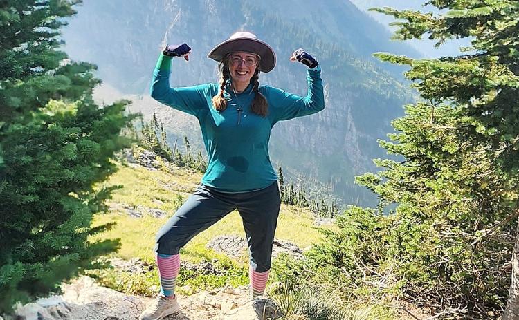 Gladwin native Becca Corah strikes a pose on a mountain hike. Corah is participating in a climb at the Grand Canyon in October to raise awareness for Kidney Donor Athletes.