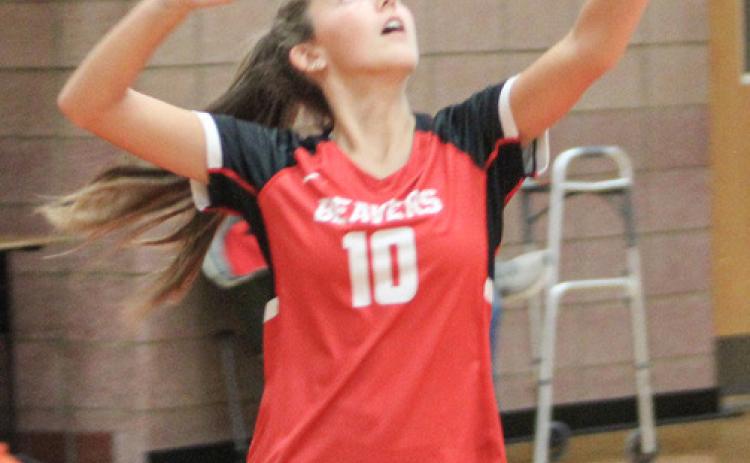 Beaverton’s Piper Carland gets ready to serve up an ace during a recent match. The Beavers split two matches last week.