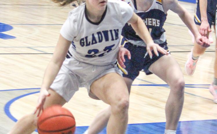 Liz Winchester and Gladwin are closing the regular season on a high note and will host a district tournament next week.