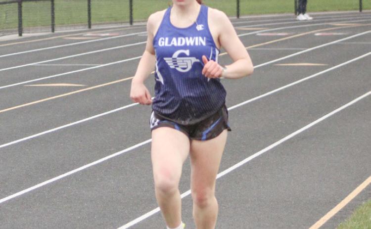 Gladwin’s Vivian Callaghan runs to a win in the 1600 meters during last Wednesday’s Jack Pine Conference event at Beaverton.