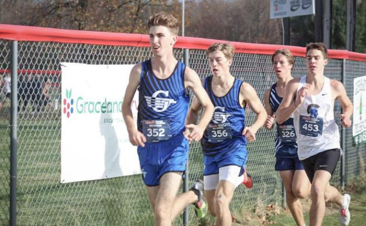 Gladwin’s Elijah Christensen won the regional championship and teammate Seth Mead was second Friday when the Flying G’s defended their title in the Divison 2 race at Benzie Central.