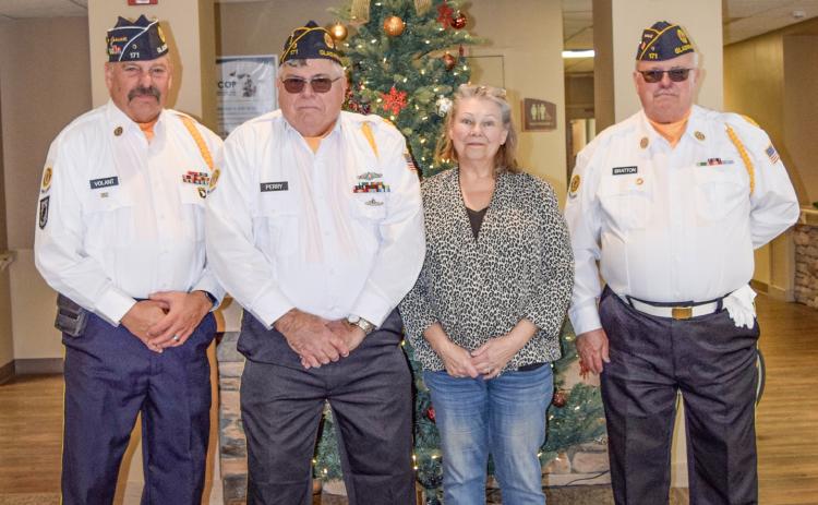 Pictured from left to right is American Legion Post 171 Commander Jim Volant, Service Officer Mike Perry, Cheryl Parmer from the West Branch Post, and Adjutant Dr. Rick Bratton.