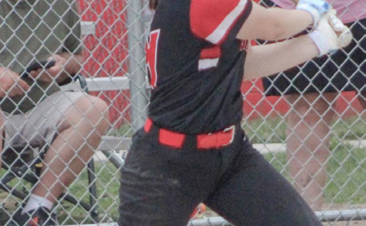 Beaverton’s Emily McCann keeps a rally going with a single during last week’s doubleheader with Harrison.