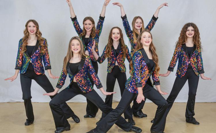 Sr. Tap received first overall in the novice level. Dancers pictured, left to right: Aloisia Graveline, Lily Hillier, Sophia Dillon, Evelyn Harrison, Brielle Graveline, Arabella MacInnes (captain), and Brynley Brubaker. More photos on page B- 10.