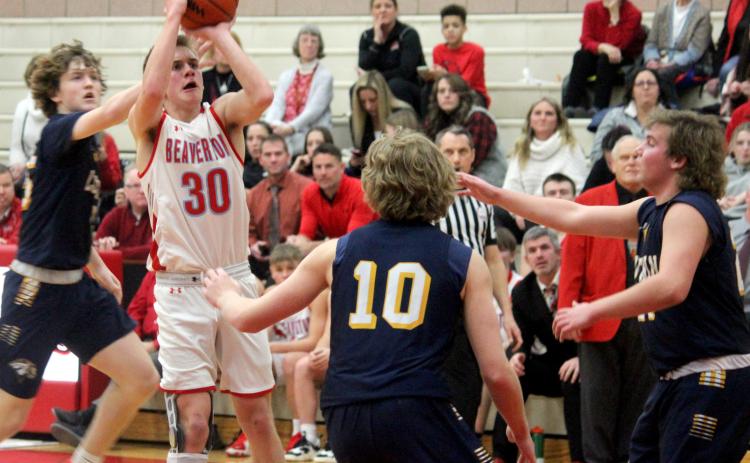 Layk Woodruff takes a shot against Saginaw Valley Lutheran.