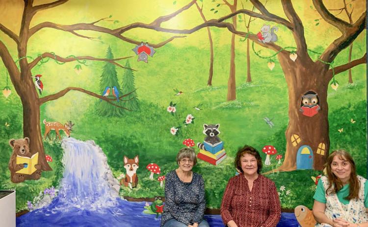 MAGICAL FOREST MURAL GREETS LIBRARY PATRONS