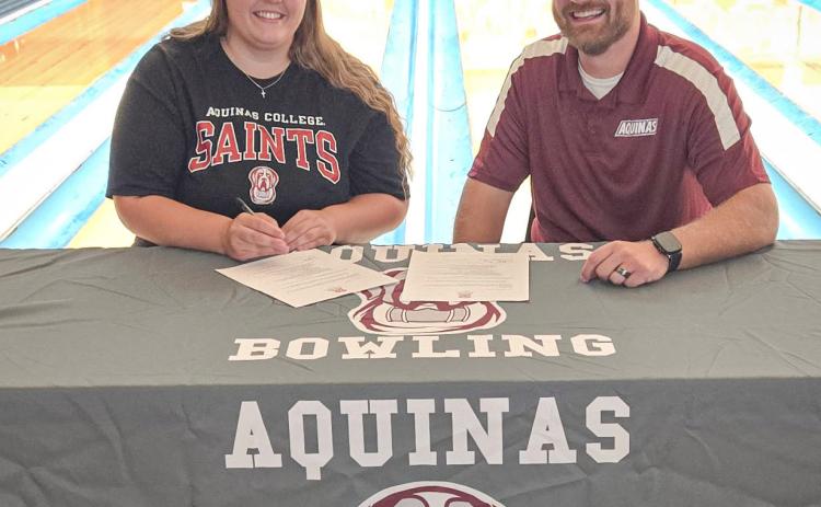 Gladwin graduate Skylar Davy signed a National Letter of Intent Friday to continue her bowling career at Aquinas College, which is led by Coach Harold Klukowski.