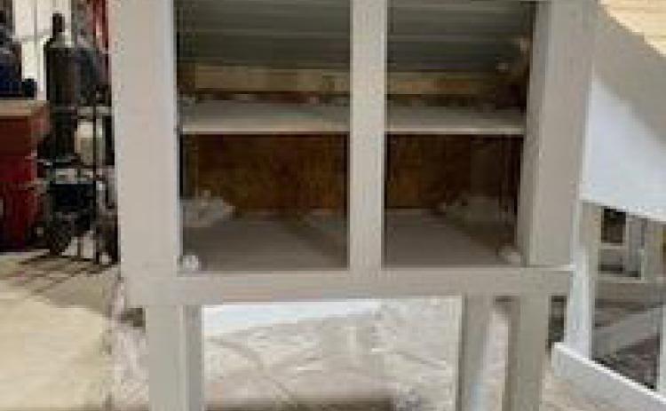 VOLUNTEERS BUILD COMMUNITY PANTRIES