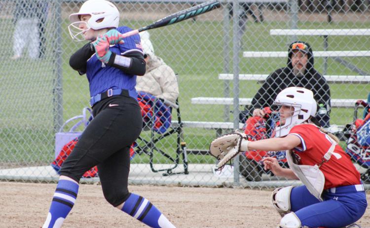 Gladwin’s Elizabeth Mickler makes contact during Friday’s doubleheader with visiting Remus Chippewa Hills.