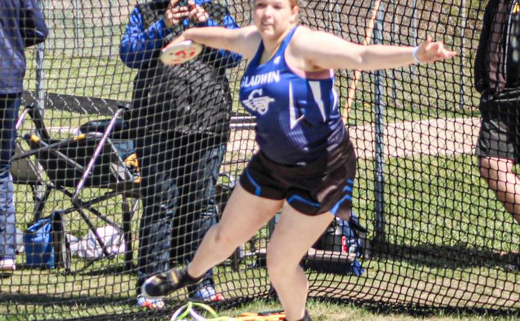 Gladwin thrower Makenzie Price put on a show at the Division 2 regional at Cadillac Friday, winning both the shot put and the discus and achieving school records in both events.
