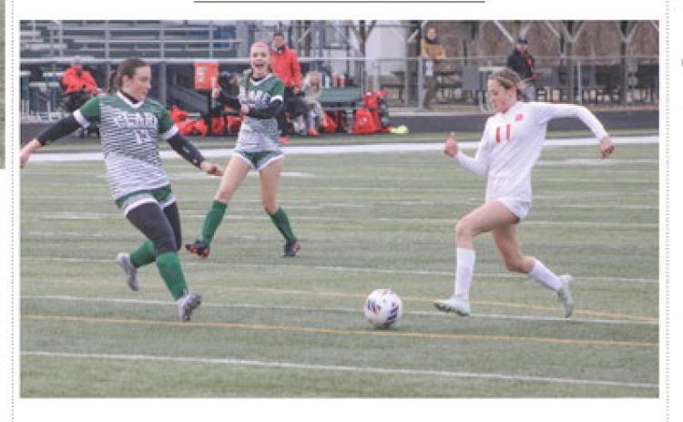 Beaverton’s Wren Carland closes in on the ball during a game earlier this season. The Beavers entered this week with a record of 1-1-1.
