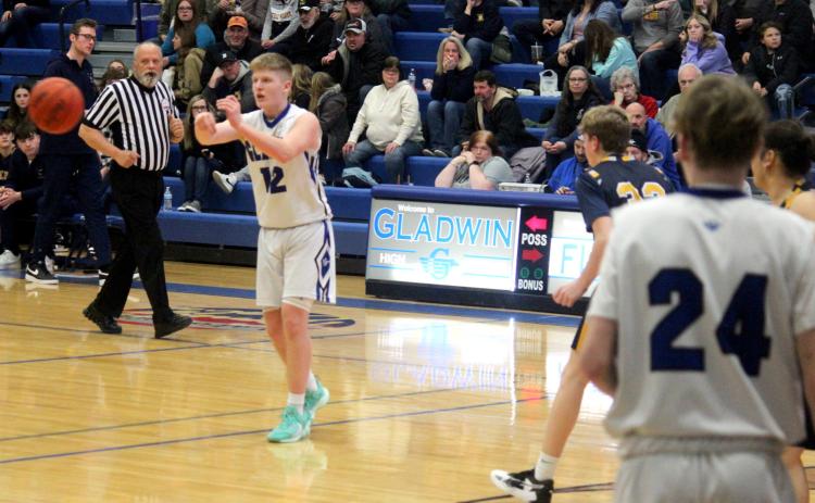 Gladwin attempts to pass the ball during Friday night’s game against Shepherd.