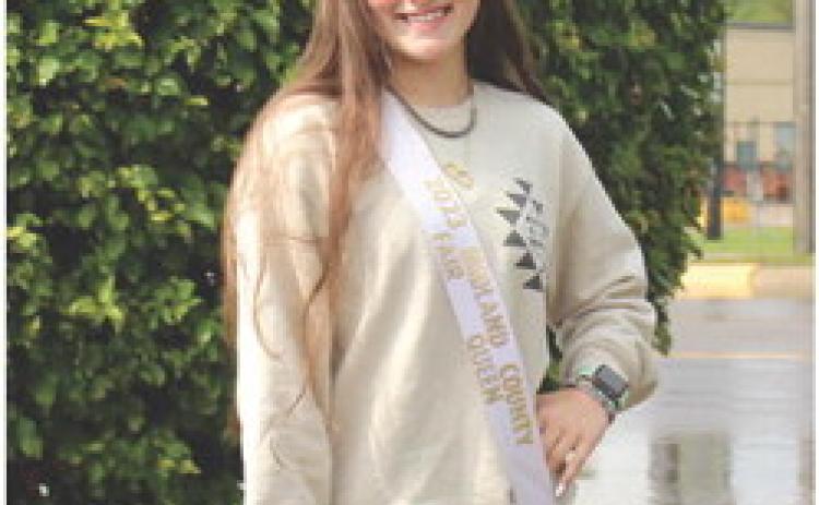 Taylor Bonham wearing her crown and sash she acquired for winning the Queens Contest at the Midland County Fair.