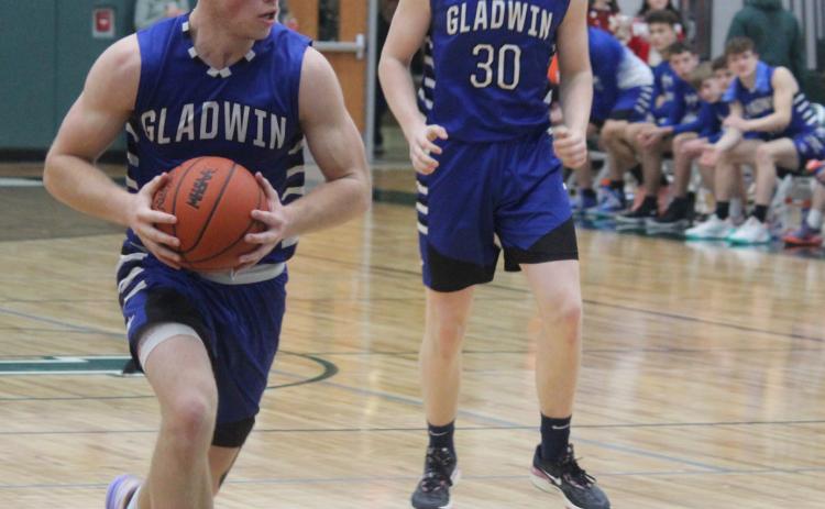 Gladwin varsity boys basketball returns from break with victory over Pinconning