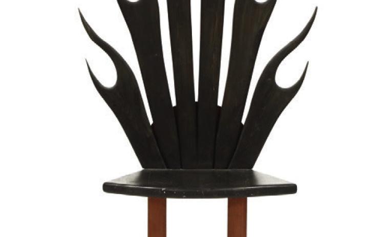 Stylized shapes, light wood, bold blocks of color and unusual construction are characteristics of modern furniture. This flame rocking chair shows all four. KOVELS.COM