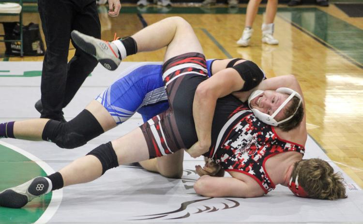 Gladwin’s Braden Ritchie puts the pressure on Beaverton’s Justin Wood. Ritchie was First Team All-Conference at 190 and Wood was Second Team.