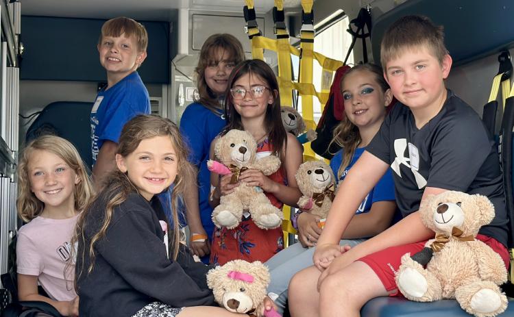 A tour of a real ambulance gives Health Occupations campers a closer look at emergency medical services.