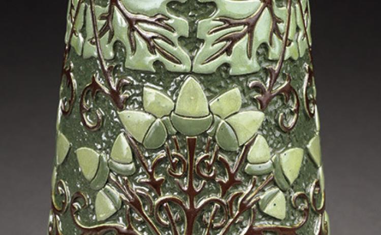 Rhead, Roseville and Della Robbia are three of the most important names in American art pottery. All of them apply to this vase. KOVELS.COM
