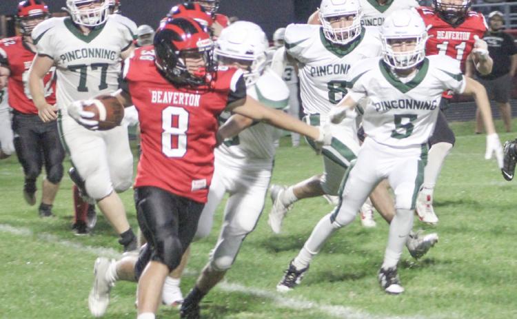 Beaverton’s Caiden Loar turns the corner and heads upfield during Friday night’s loss to visiting Pinconning.