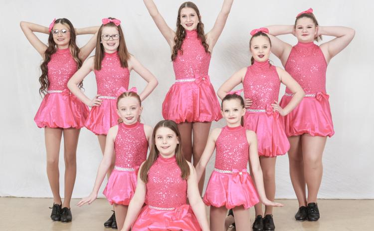 Jr. Tap earned the highest possible adjudication of a platinum, plus an overall and a special judges’ award highlighting how clean their dance was performed. Dancers pictured left to right are: Ava Adame, Jasmine Muma, Jaelyn Greenman, Paige Kruske, Ragen Burgess, Rylee Garvie, Maggie Lang, and Morgan Fitzpatrick.
