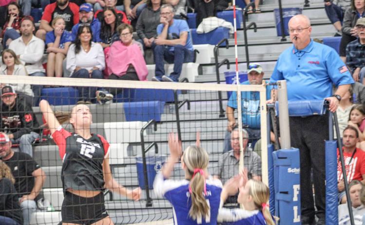 Beaverton’s Trinity Danielak makes a play at the net last season. The junior is back in the starting lineup this fall.